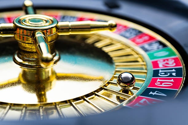 Payout table displayed on arcade game interface showing bet options and payoff ratios